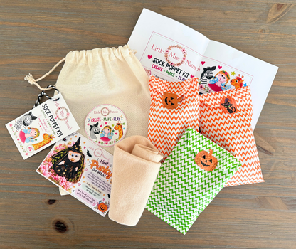 Punky witch sock puppet kit packaging with a drawstring bag, instruction sheet, character card and Halloween craft packets